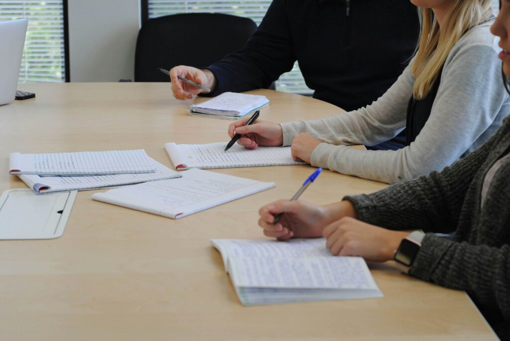 Couple signing uncontested divorce document.